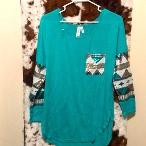 Woman’s small teal and Aztec sequin pattern top